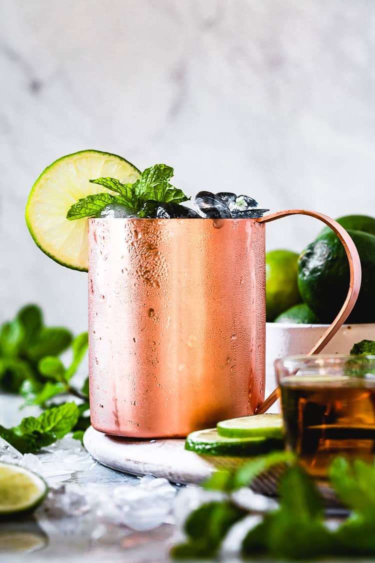 Kentucky Mule - a mule cup filled with ice and garnished with lime