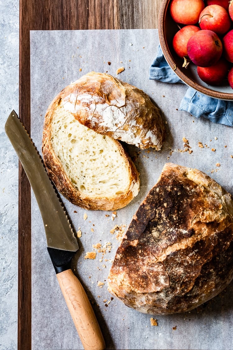 No Knead Bread Recipe - Sliced rustic bread photographed from the top view.