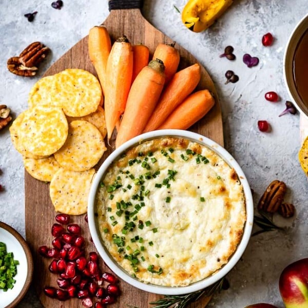 Baked Goat Cheese Dip recipe served with vegetables and crackers