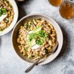 healthy white chicken chili in two bowls side by side