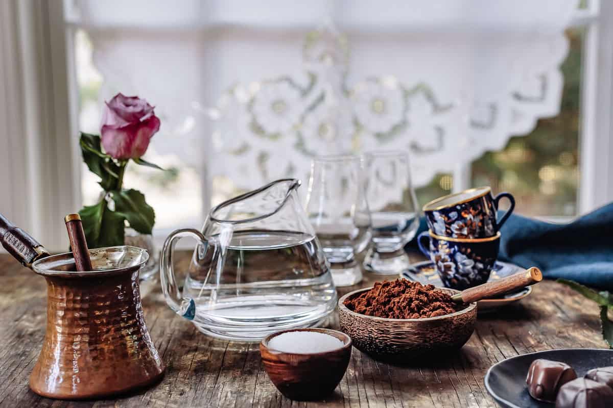 The equipment needed to make Turkish coffee, including cezve and Turkish coffee cups.