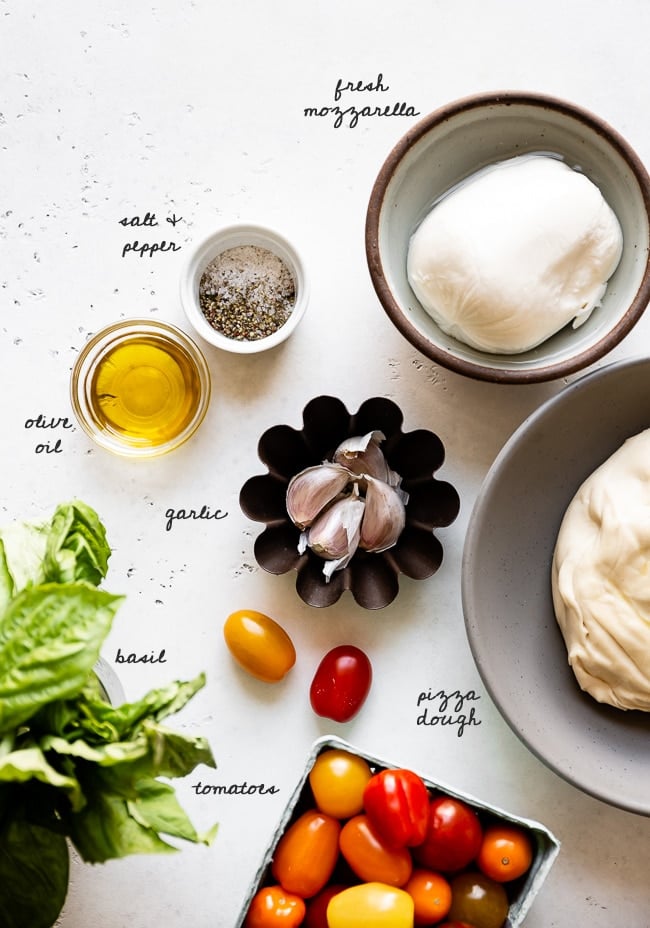 Caprese Pizza Ingredients are photographed from the top view.