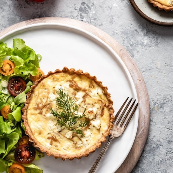 Buttery crust filled with sweet caramelized onions, earthy goat cheese, and fresh thyme baked to perfection. This Goat Cheese Quiche with Caramelized Onions is a great breakfast or brunch dish that is guaranteed to please.