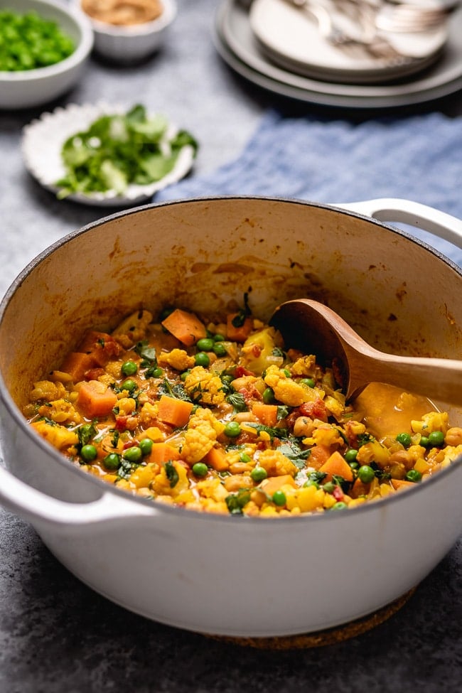 Cooked dish is photographed from the front view in a big pot.