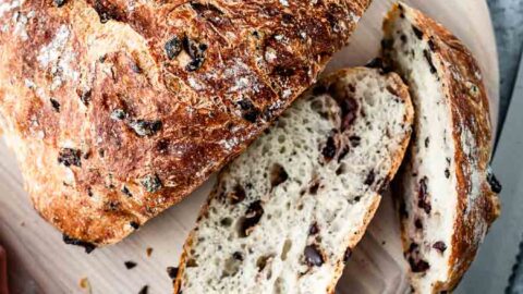 A loaf of olive bread sliced