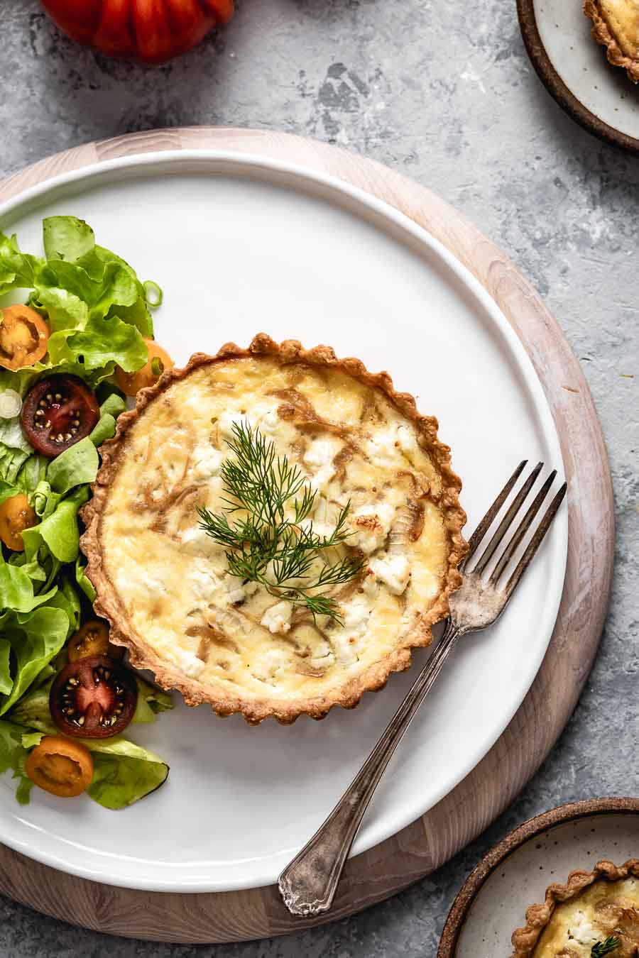 Goat cheese quiche with green salad on the side.