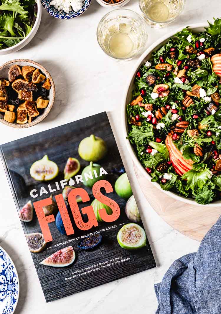 Fall Harvest Salad recipe photographed with a cookbook by its side.