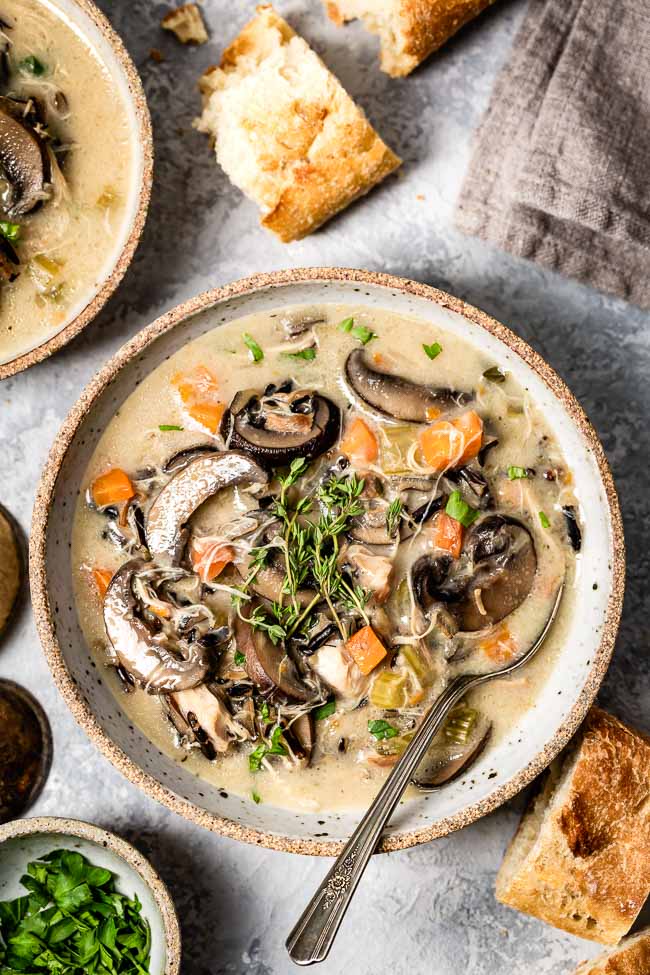 Chicken Wild Rice Soup made in an instant pot placed in a bowl and photographed from the top view.