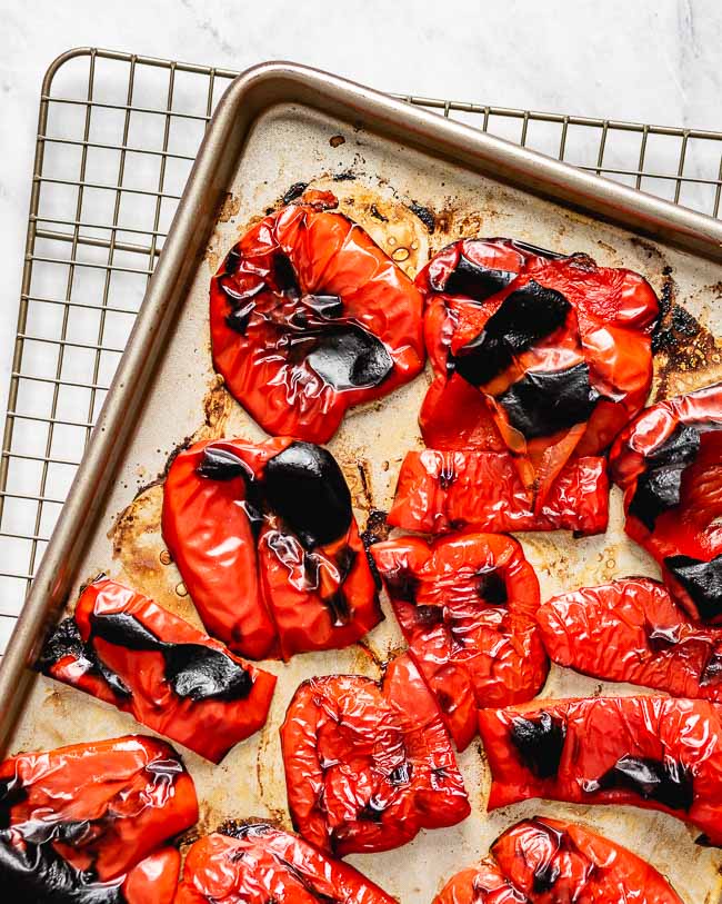 Red peppers are roasted and charred