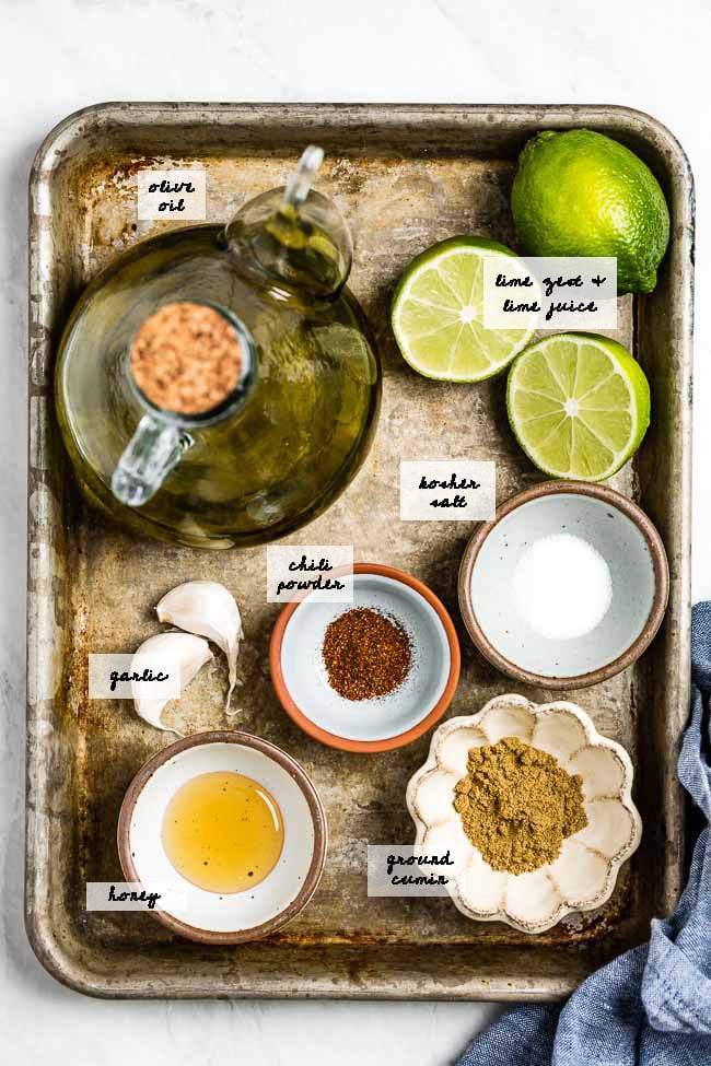 Chili Lime Dressing Ingredients photographed in a tray all together from the top view