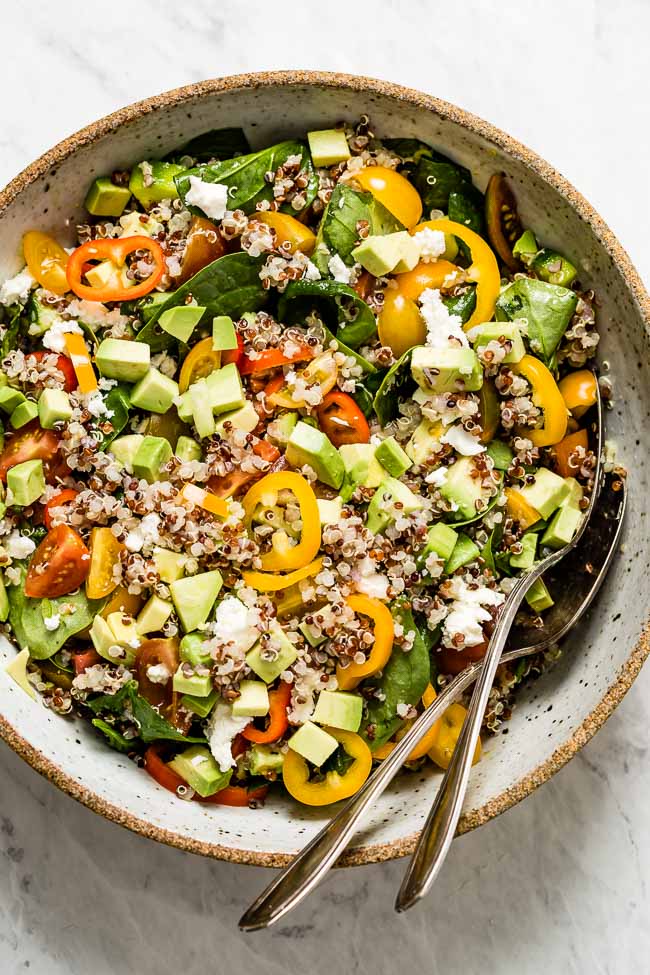 quinoa avocado salad in a bowl from the top view