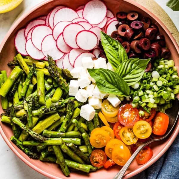 Spring salad with each ingredients organized in a bowl from the top view