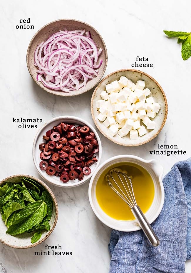 Flavoring ingredients (red onion, feta, vinaigrette, olives, and mint)