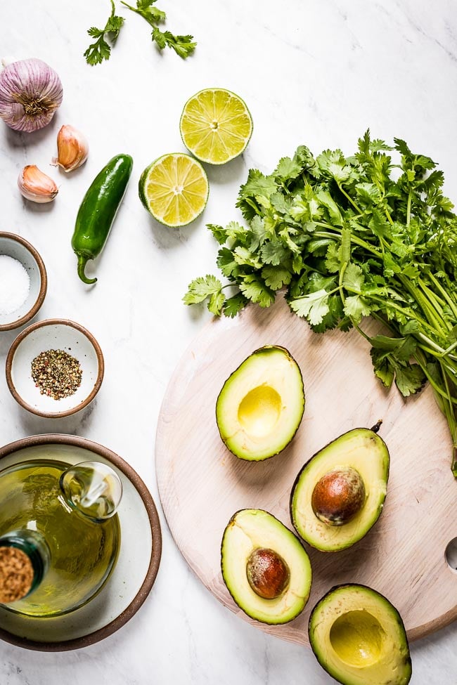 Ingredients for creamy guacamole dressing