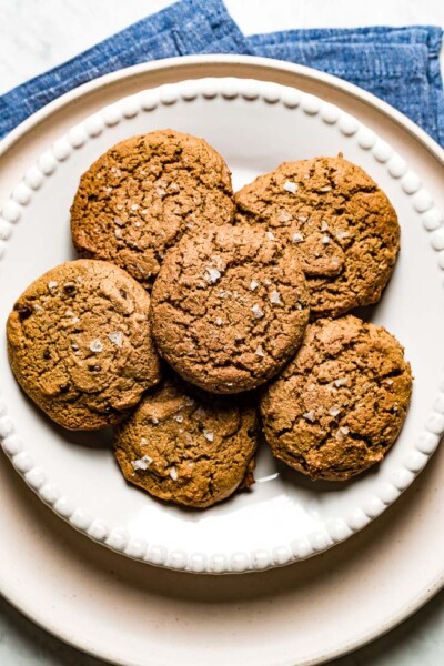 Almond Flour Peanut Butter Cookies are placed on a plate on top of each other