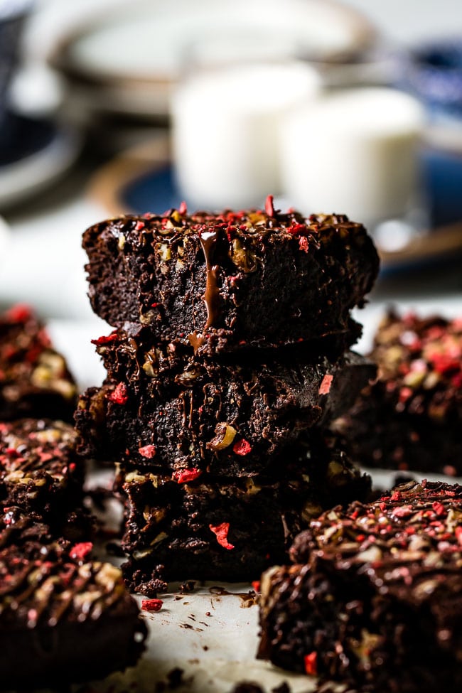 Almond Flour Brownies sliced and placed on top of each other.