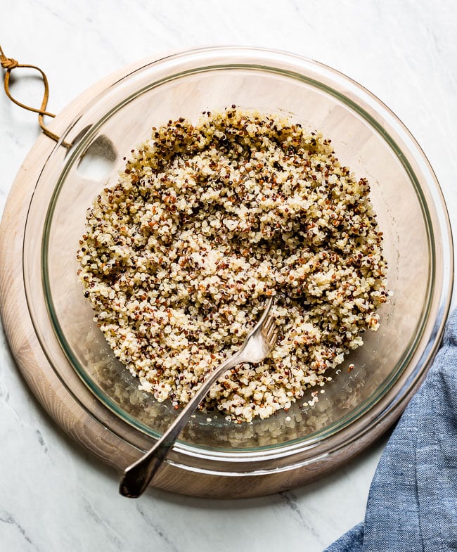 Microwave quinoa in a bowl with a fork