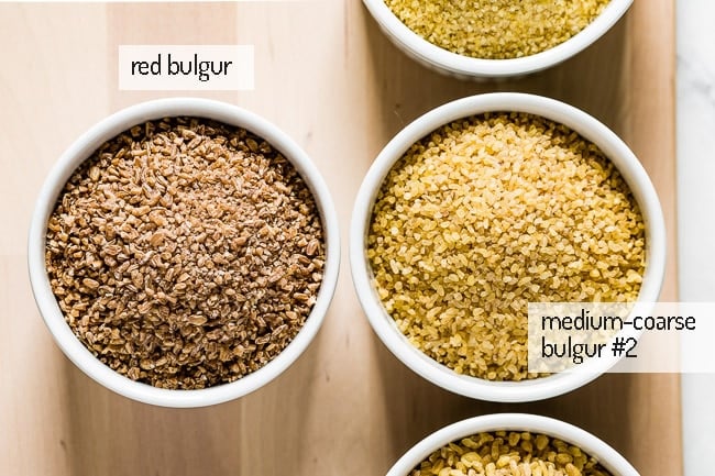 Medium coarse and red bulgur from in bowls from the top view