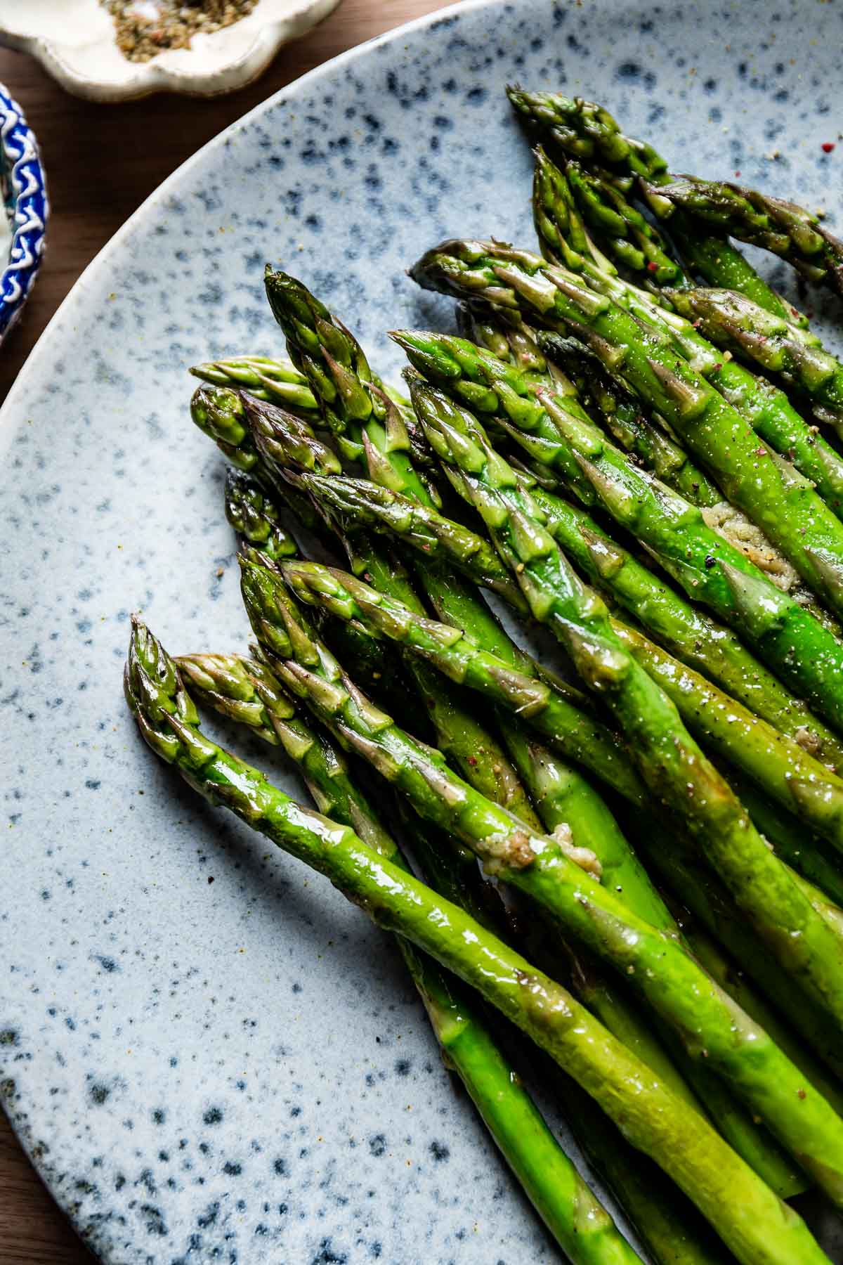 Garlic Butter Asparagus on a plate close up