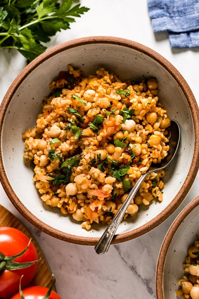 Turkish Bulgur Pilaf in a bowl with a spoon on the side