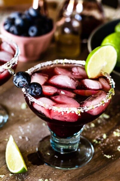 Blueberry Margarita garnished with blueberries and lime