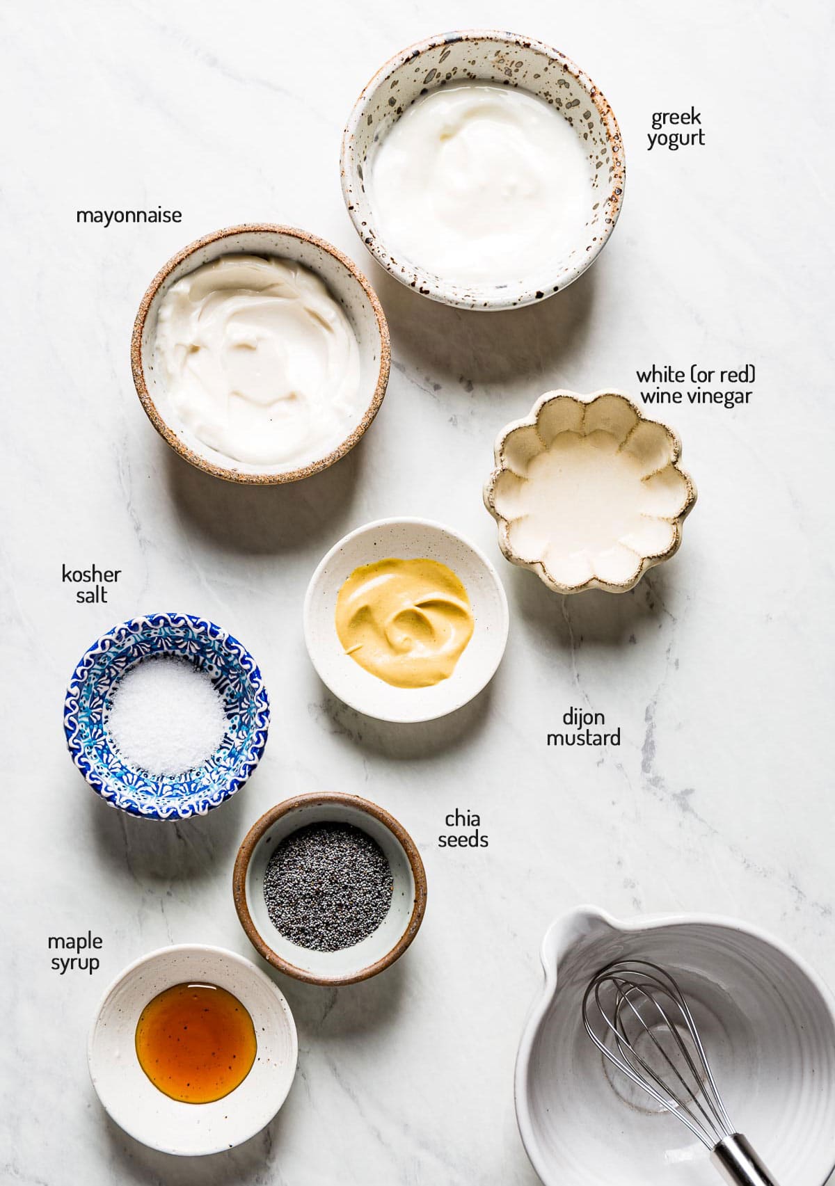 Ingredients for the recipe photographed on a white marble