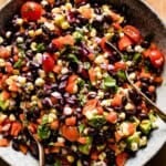 Black bean corn avocado salad in a bowl from the top view.