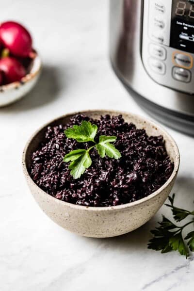 Instant pot black rice in a bowl from the front