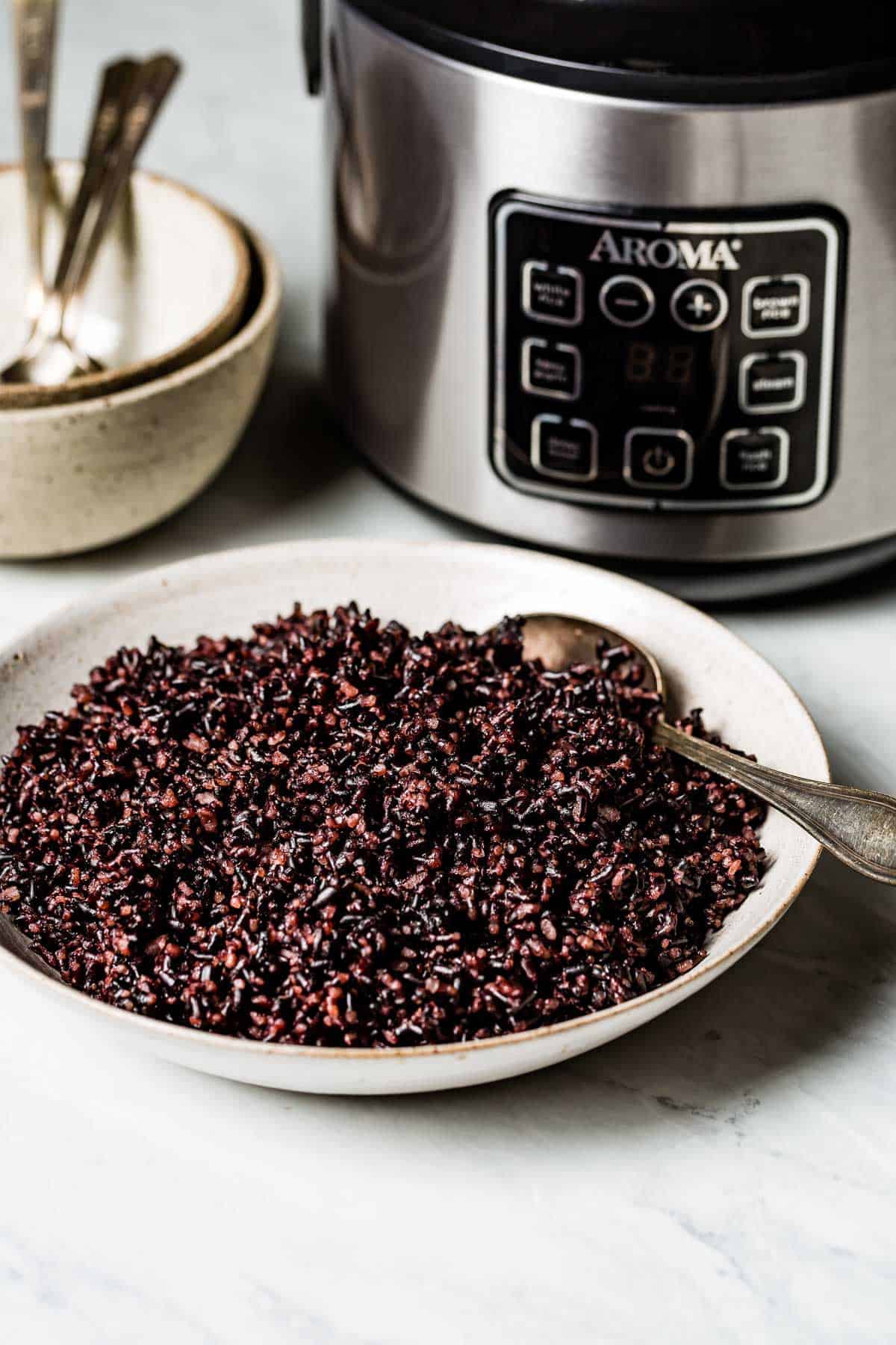 https://foolproofliving.com/wp-content/uploads/2021/07/Black-Rice-in-rice-cooker.jpg