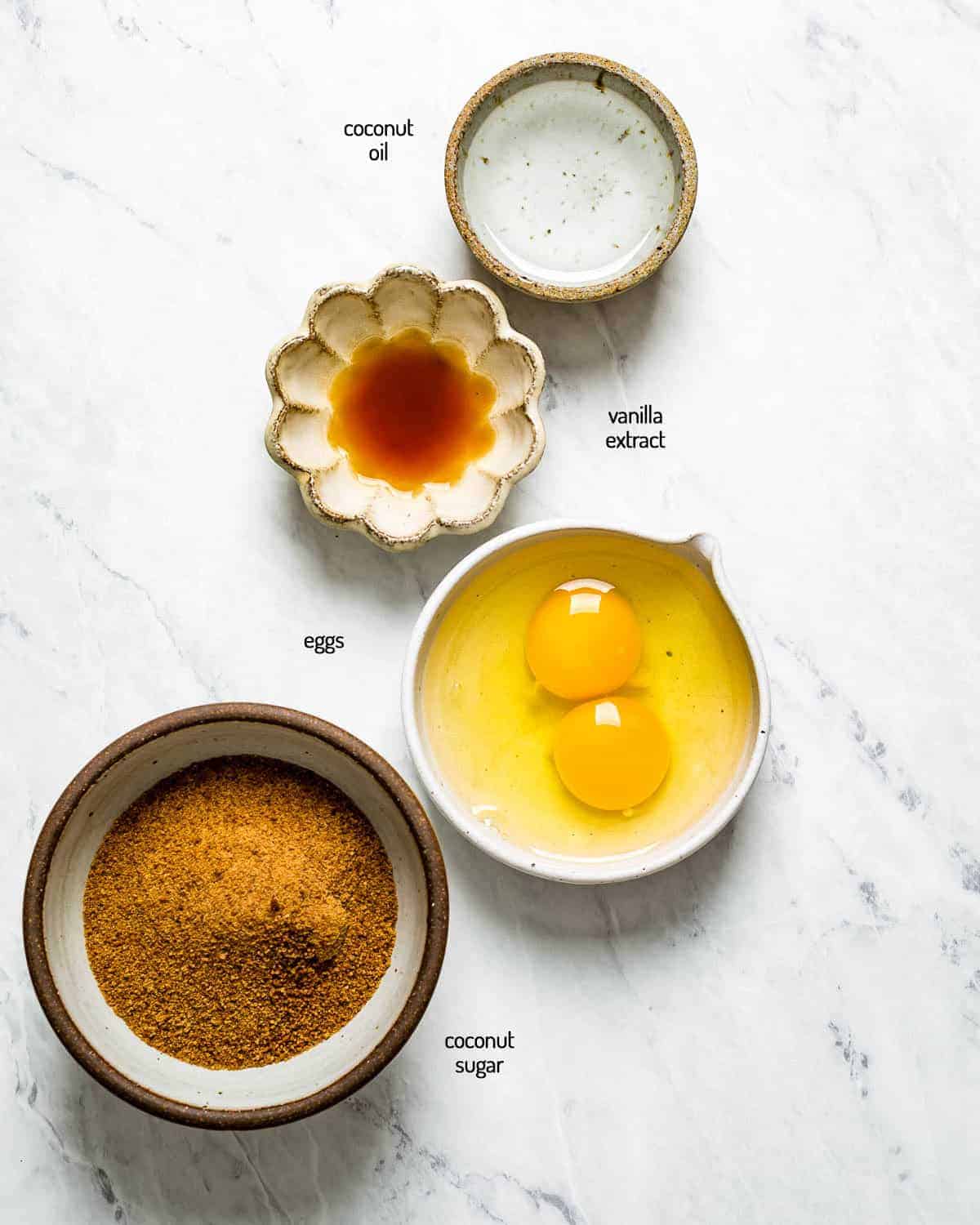 Wet ingredients are laid out in small bowls