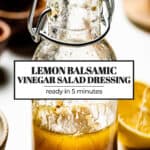 Lemon balsamic salad dressing in a bottle with text on it.