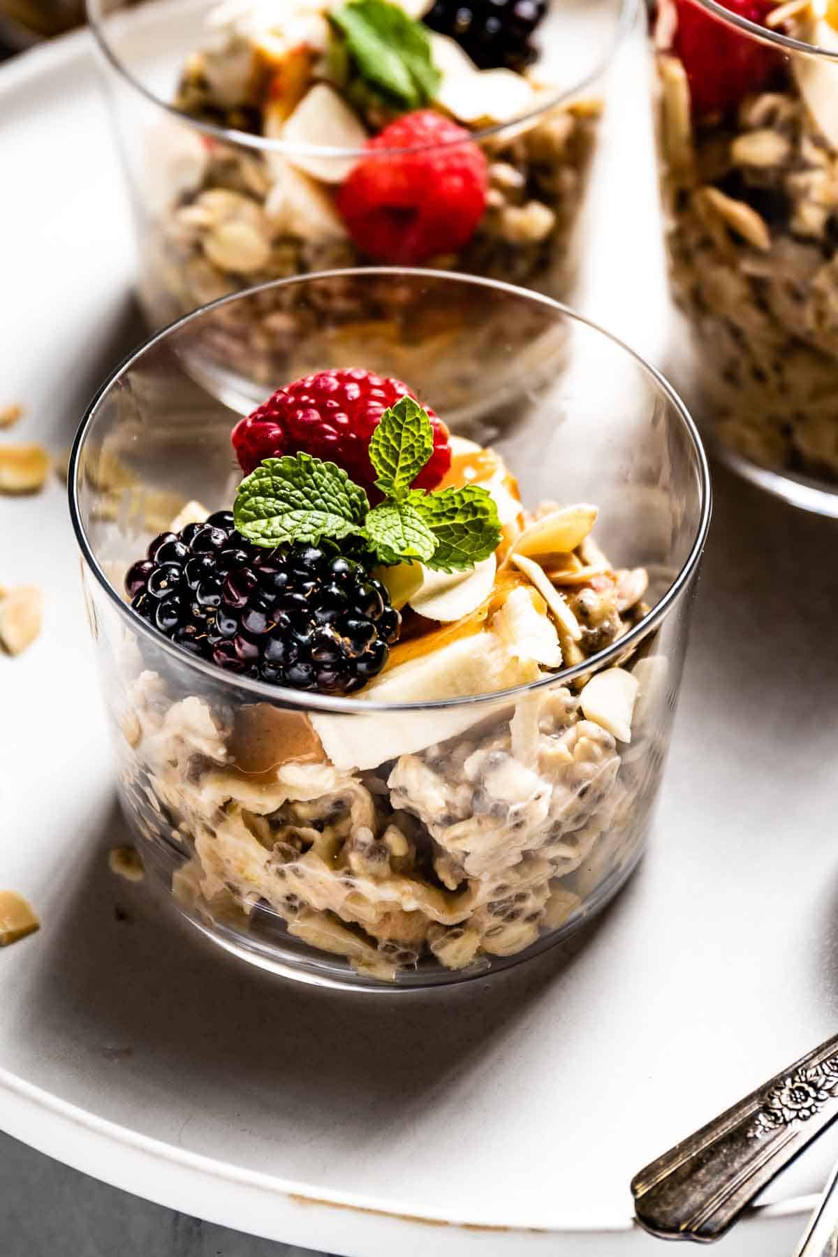 Overnight muesli in a glass garnished with fruit