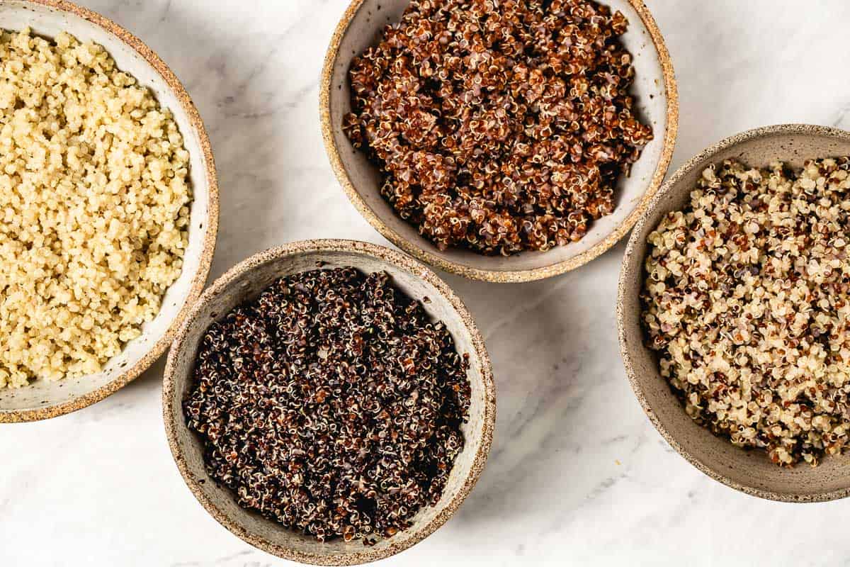 Cooked quinoa in small bowls