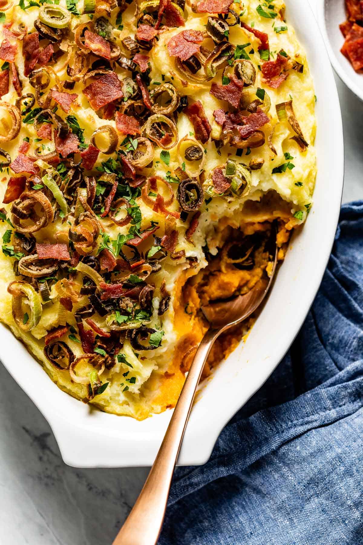 Mashed potato casserole from the top loaded with bacon and leeks