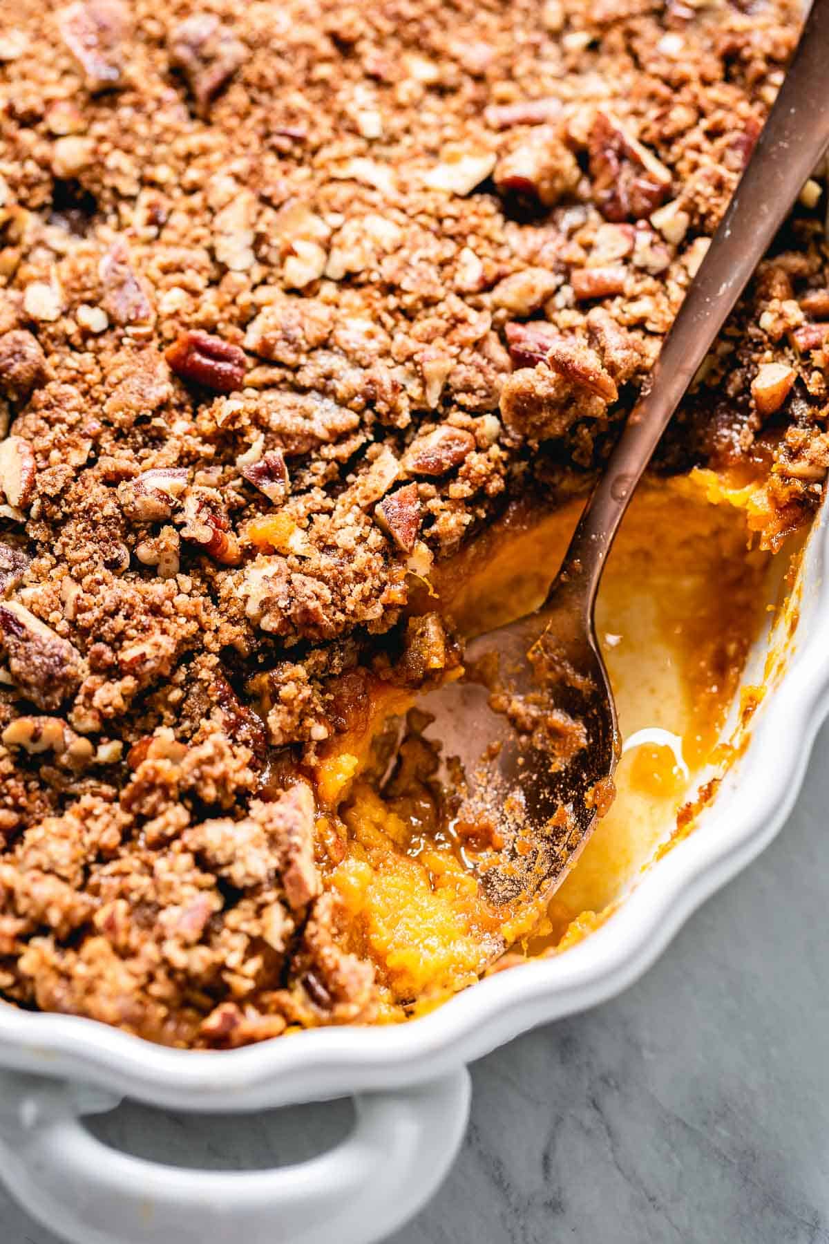 Sweet Potato Casserole with a portion of it taken out