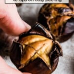 roasted chestnut in a persons hand