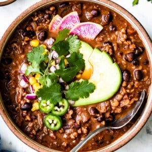 Vegan chili in a bowl from the top view.