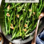 Butter Garlic String Beans in a tin with text on the image