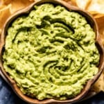 4 Ingredient guacamole served in a bowl from the top view