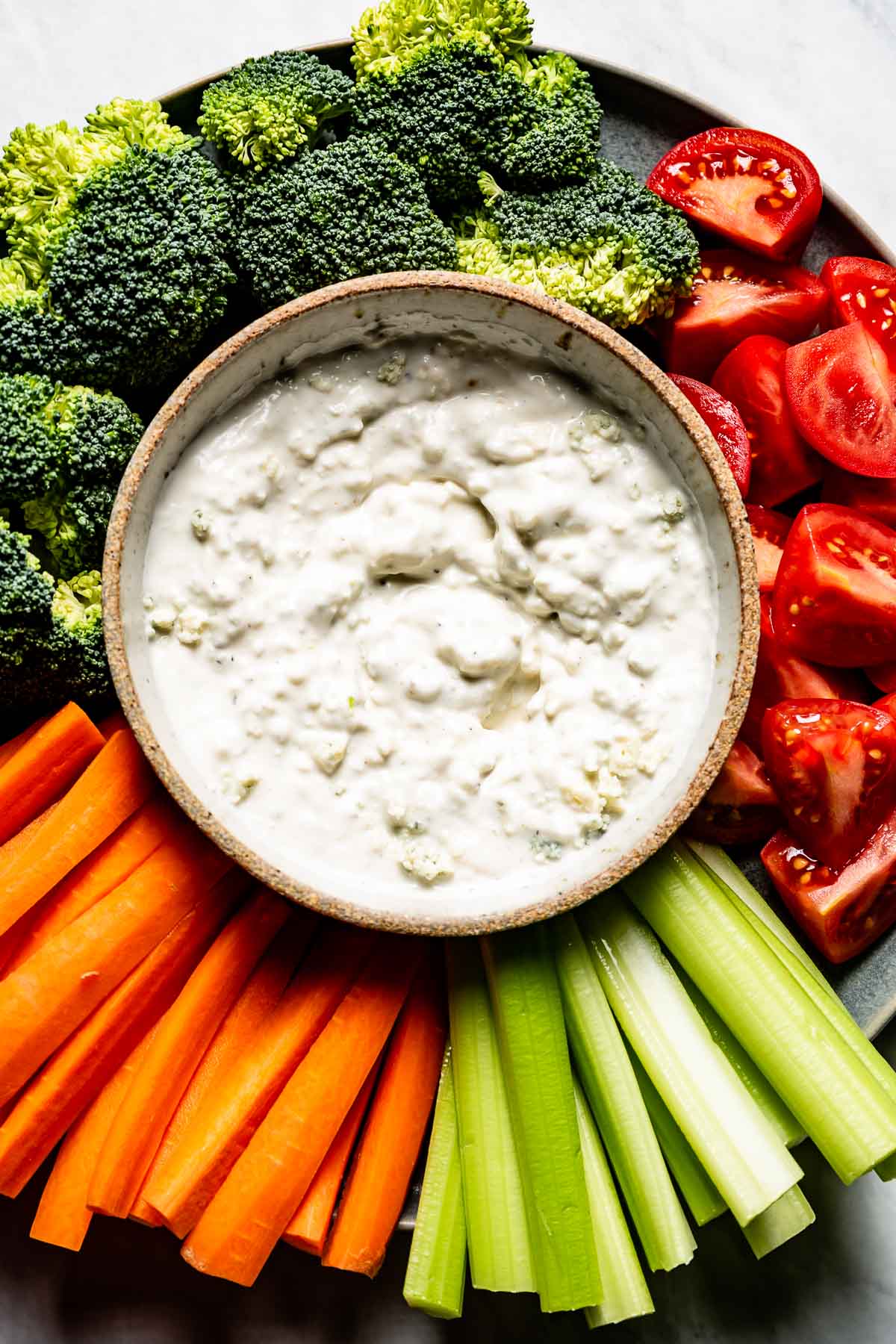 Healthy blue cheese dip served with vegetables on the side