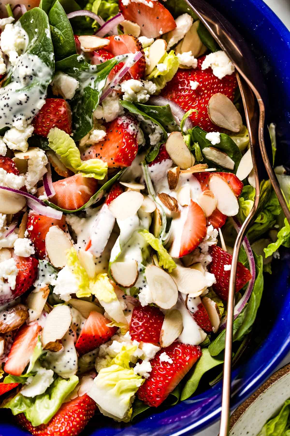 Spinach strawberry salad in a large salad bowl