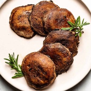 roasted portobello mushrooms garnished with rosemary