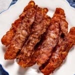 Air fryer turkey bacon on a plate close up