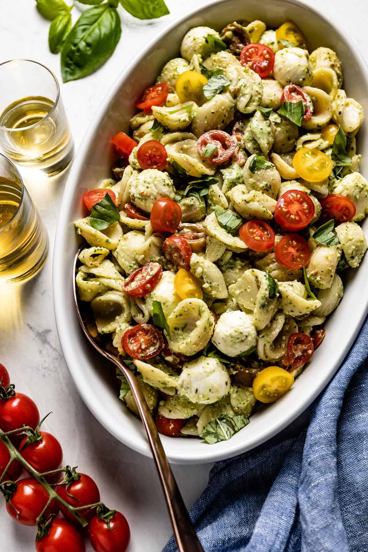 Caprese Salad with Pesto in a large bowl from the top view
