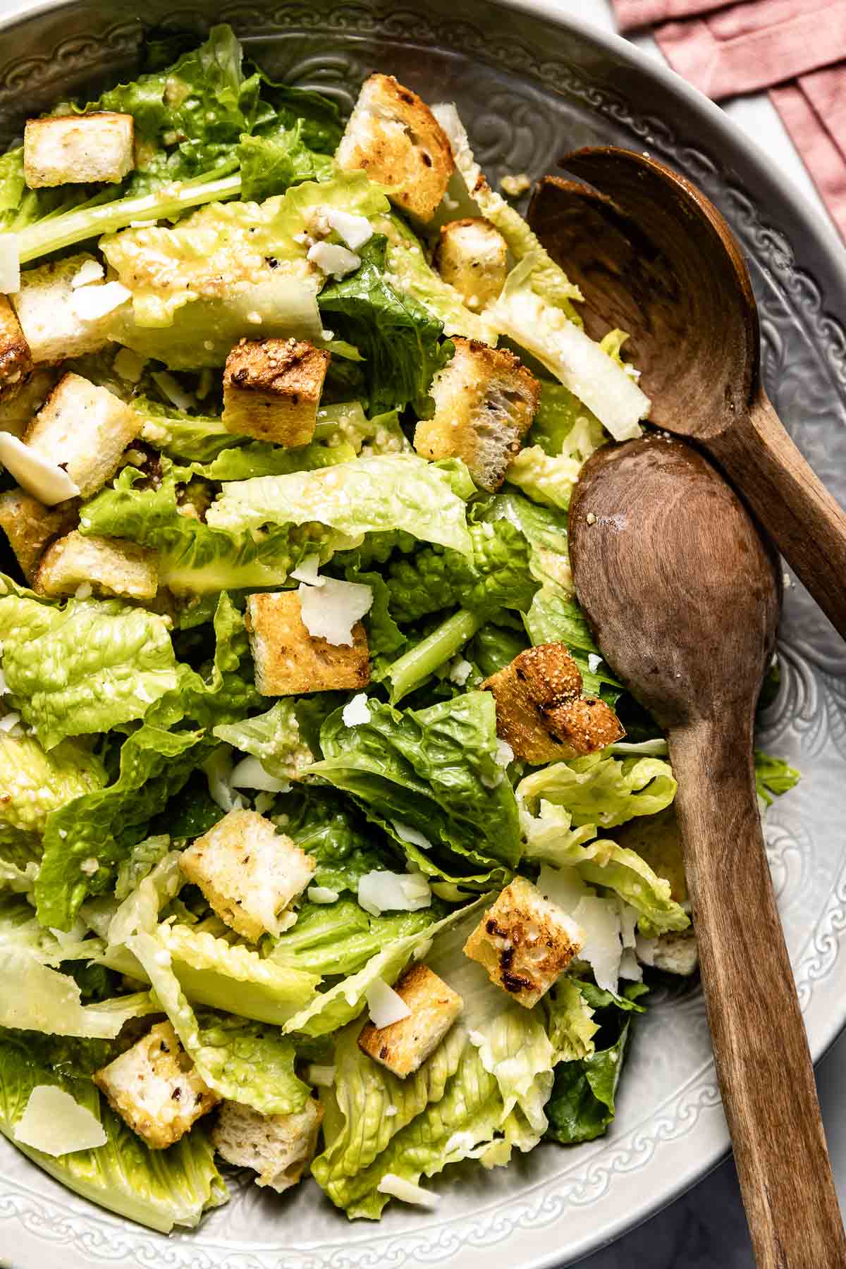 Caesar salad in a bowl from the top view