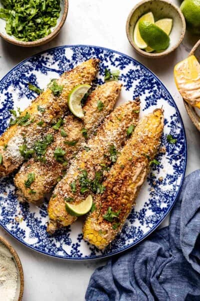 air fryer elote on a plate from the top view