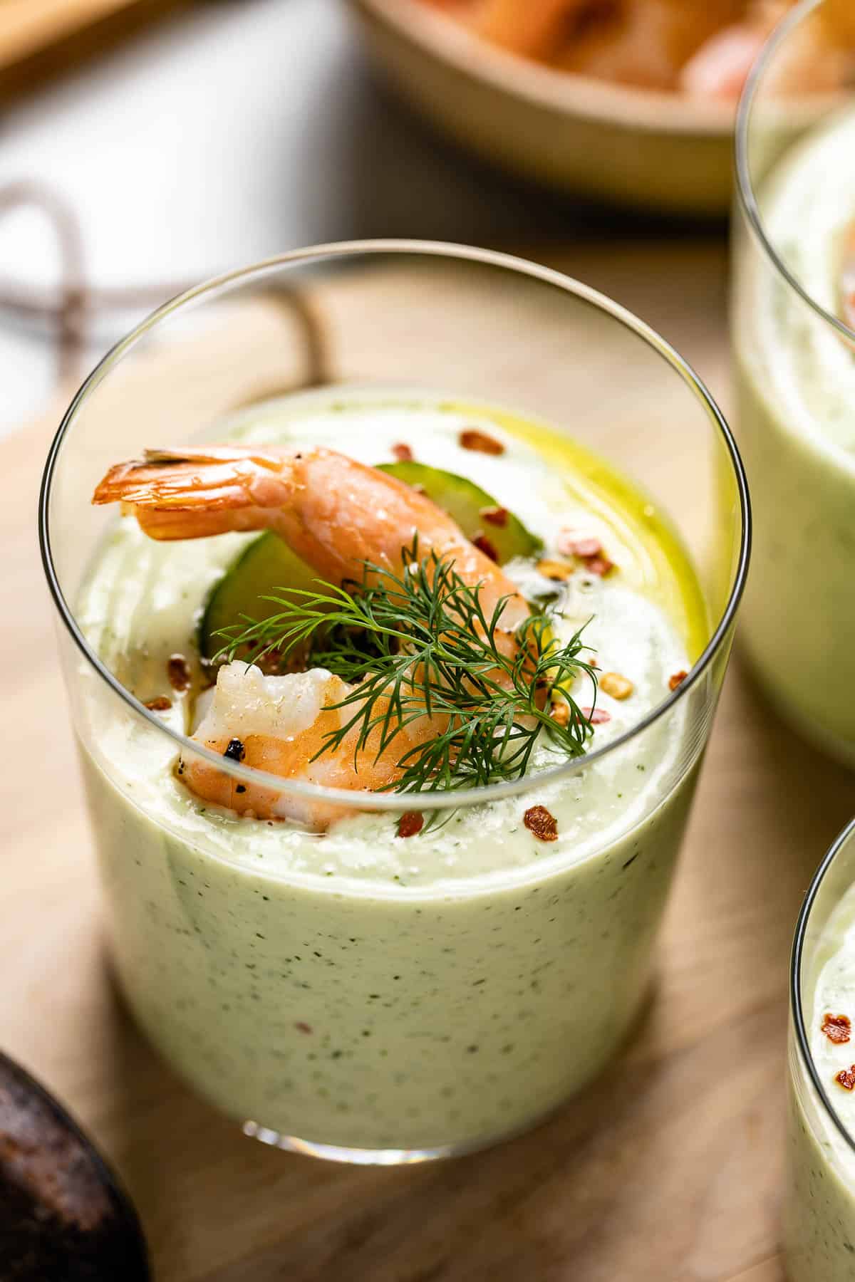 chilled cucumber soup with shrimp from the front view