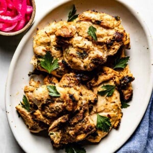 Greek yogurt chicken marinade on a plate from the top view