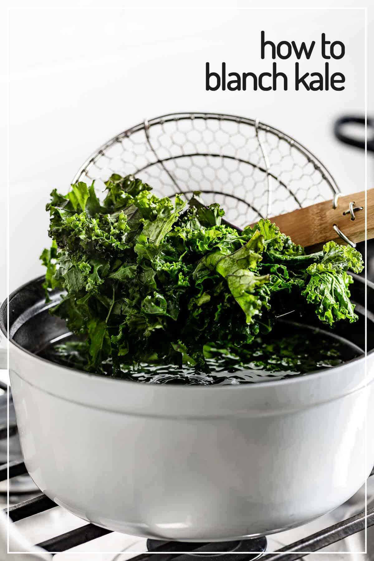 A person removing blanched kale from a pot of water from the side view.