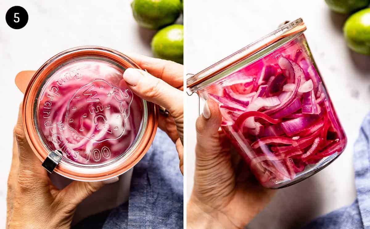 person shaking a jar of marinated red onions for tacos 